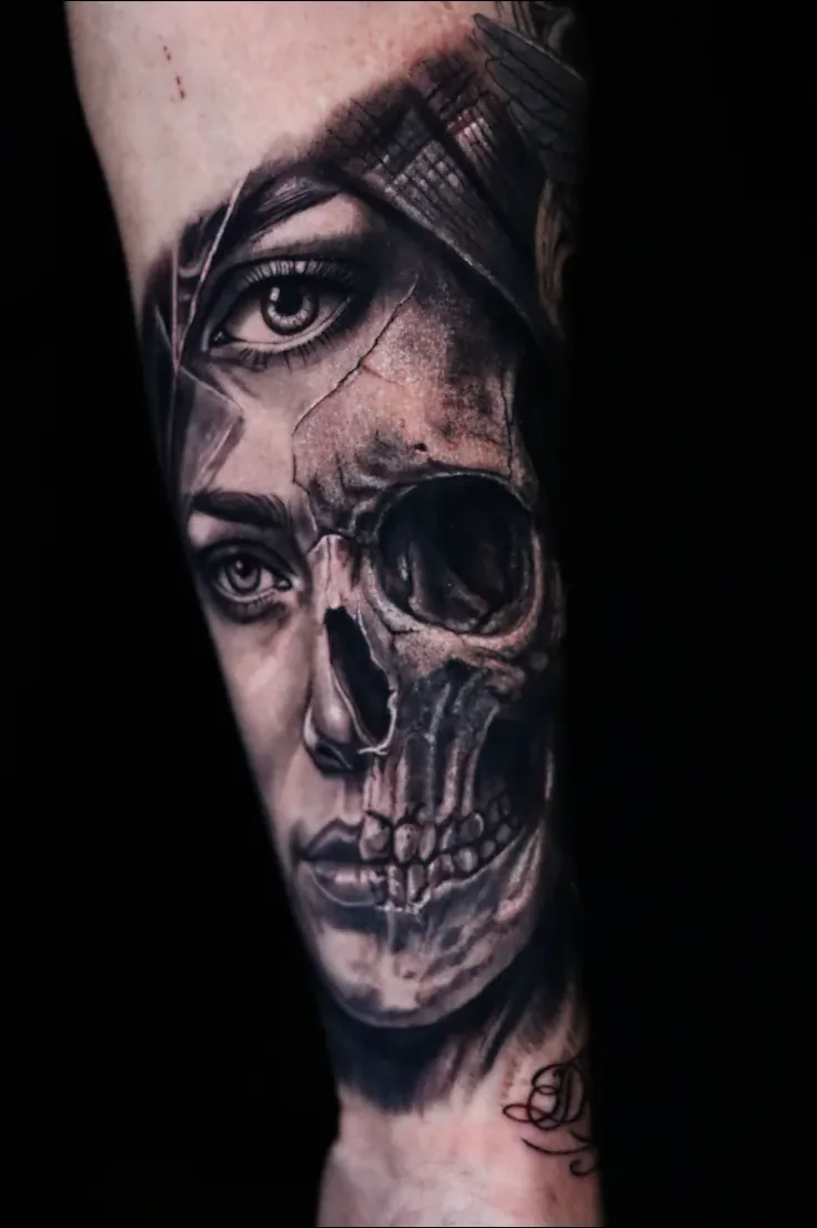 Black and grey surrealist tattoo merging a woman's face with a skull, healed work by Juliana Farinazzo